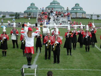 60 +/- Complete Sets of Red, Black and White DeMoulin Marching Band