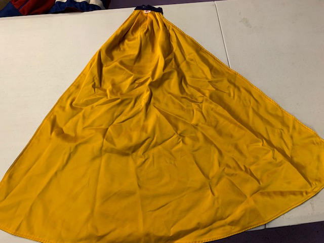 Item#0110PurpleGoldCaps010 Item Description: This is a lot of purple and gold/yellow reversible cape