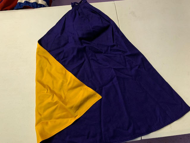 Item#0110PurpleGoldCaps010 Item Description: This is a lot of purple and gold/yellow reversible cape