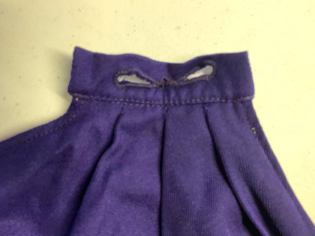 Item#0110PurpleGoldCaps010 Item Description: This is a lot of purple and gold/yellow reversible cape