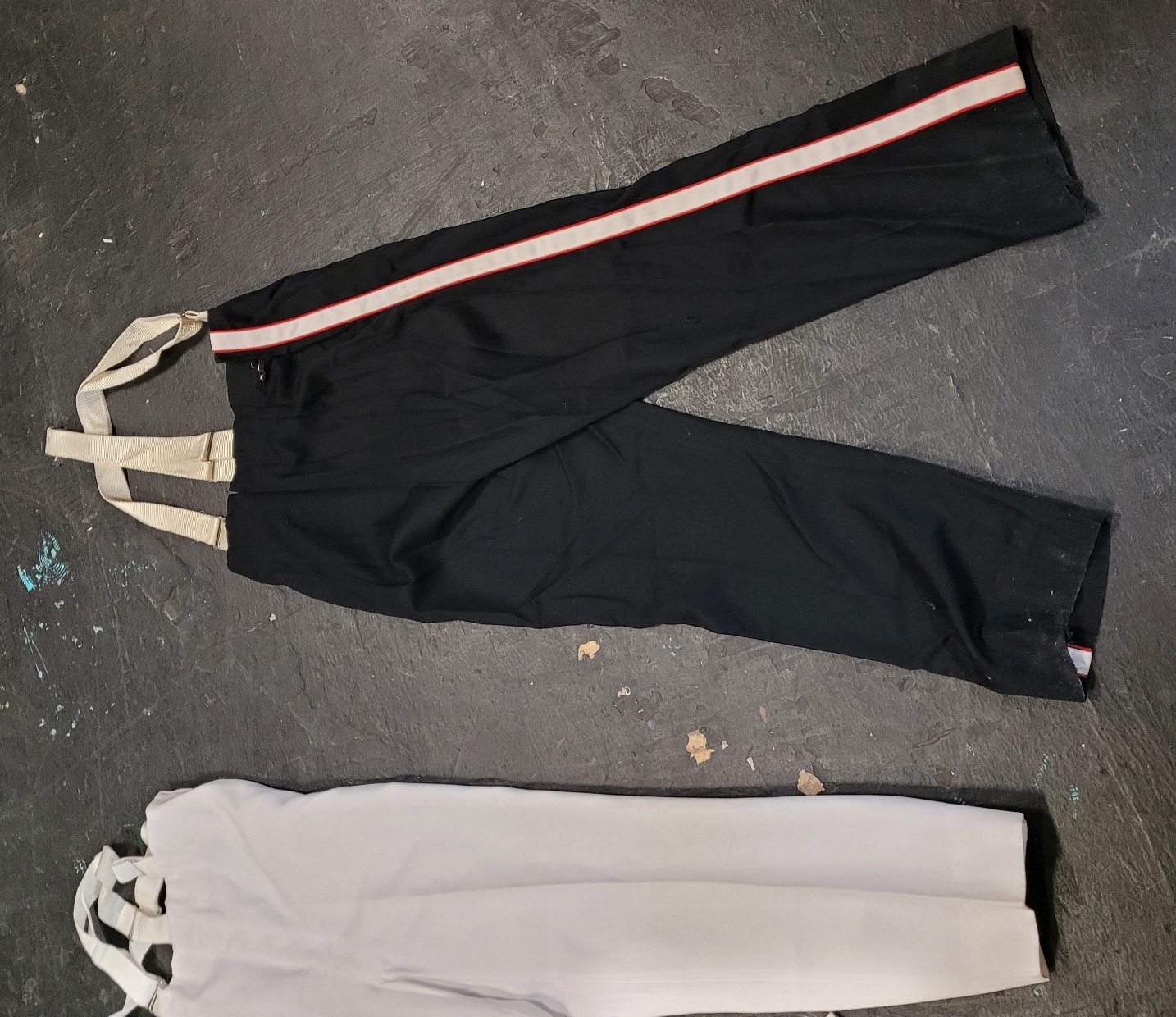 125 Used Red, Black, and White Marching Band Uniforms. Item description: The jacket is red, black an
