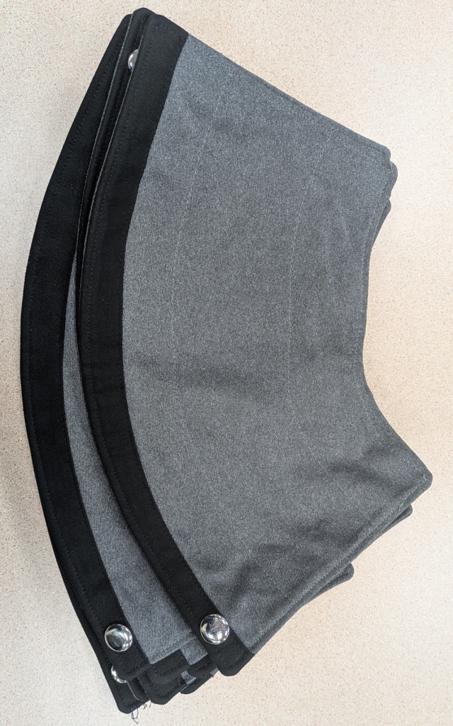 This is a lot of 97+/- used gray and black Stanbury marching band uniforms made with 100%