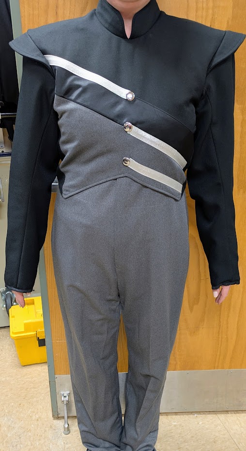 This is a lot of 97+/- used gray and black Stanbury marching band uniforms made with 100%