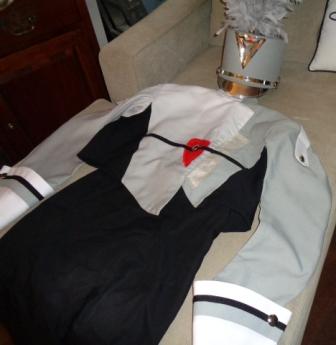 Large Set of 255 Grey, Red and Black Used Marching Band Uniforms Item Description: This is a lot of 