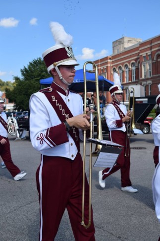Set of 100 Cardinal Red and White DeMoulin Band uniforms and hats. Item description: There are rough