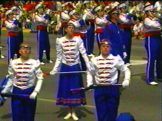 Set of 86 +/- Blue and White w/ Red Trim DeMoulin Marching Band Uniforms