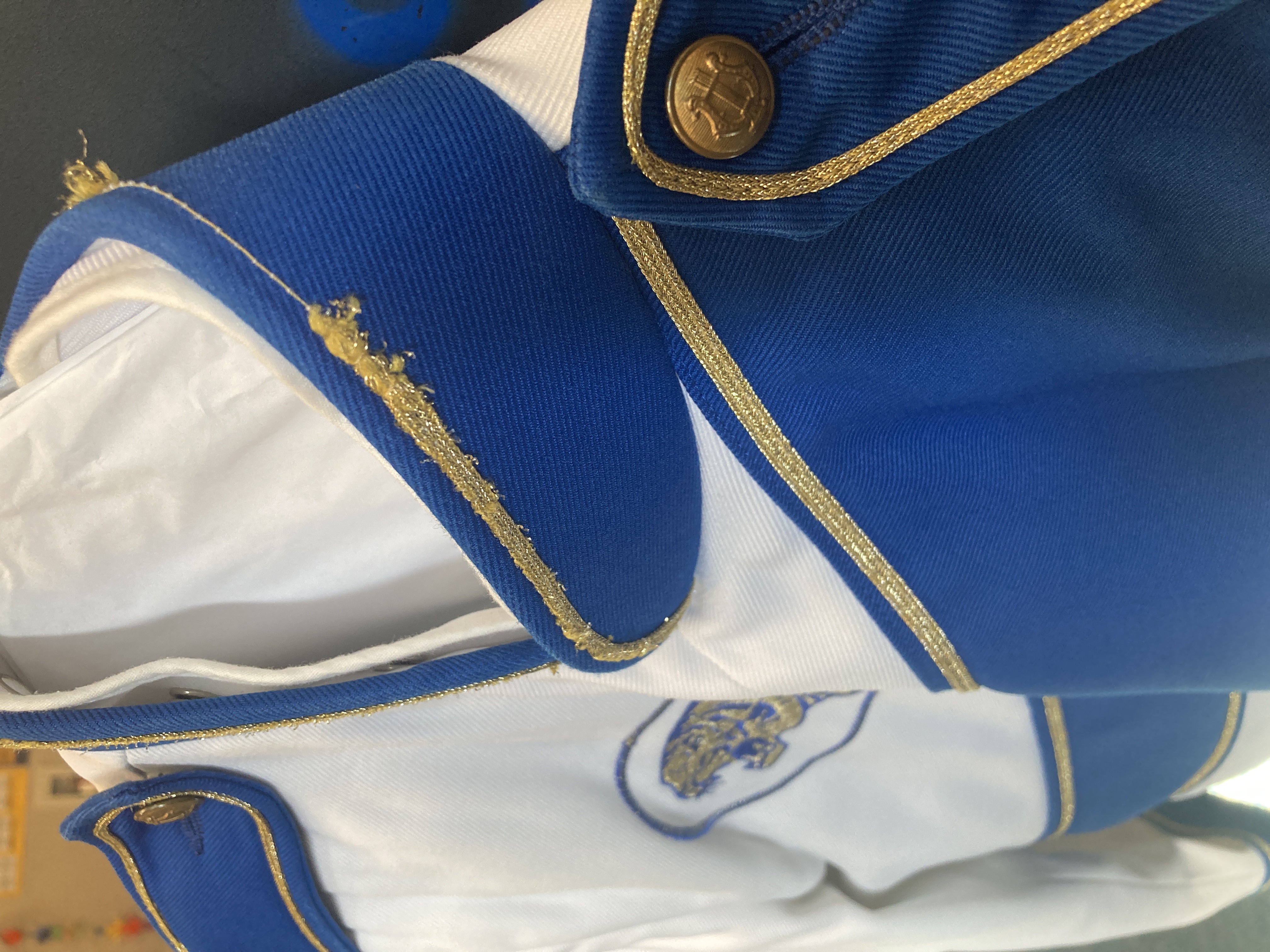 Set of 175 Blue and White Stanbury Marching Band Jackets and Black Fruhauf Bibs Item description: Ja