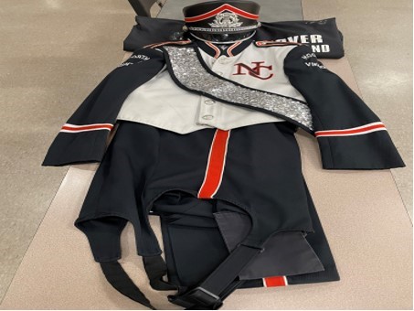 Item#0522RON2120 Item description: Set of 220 Orange, Black and White Standbury Uniforms This is a c