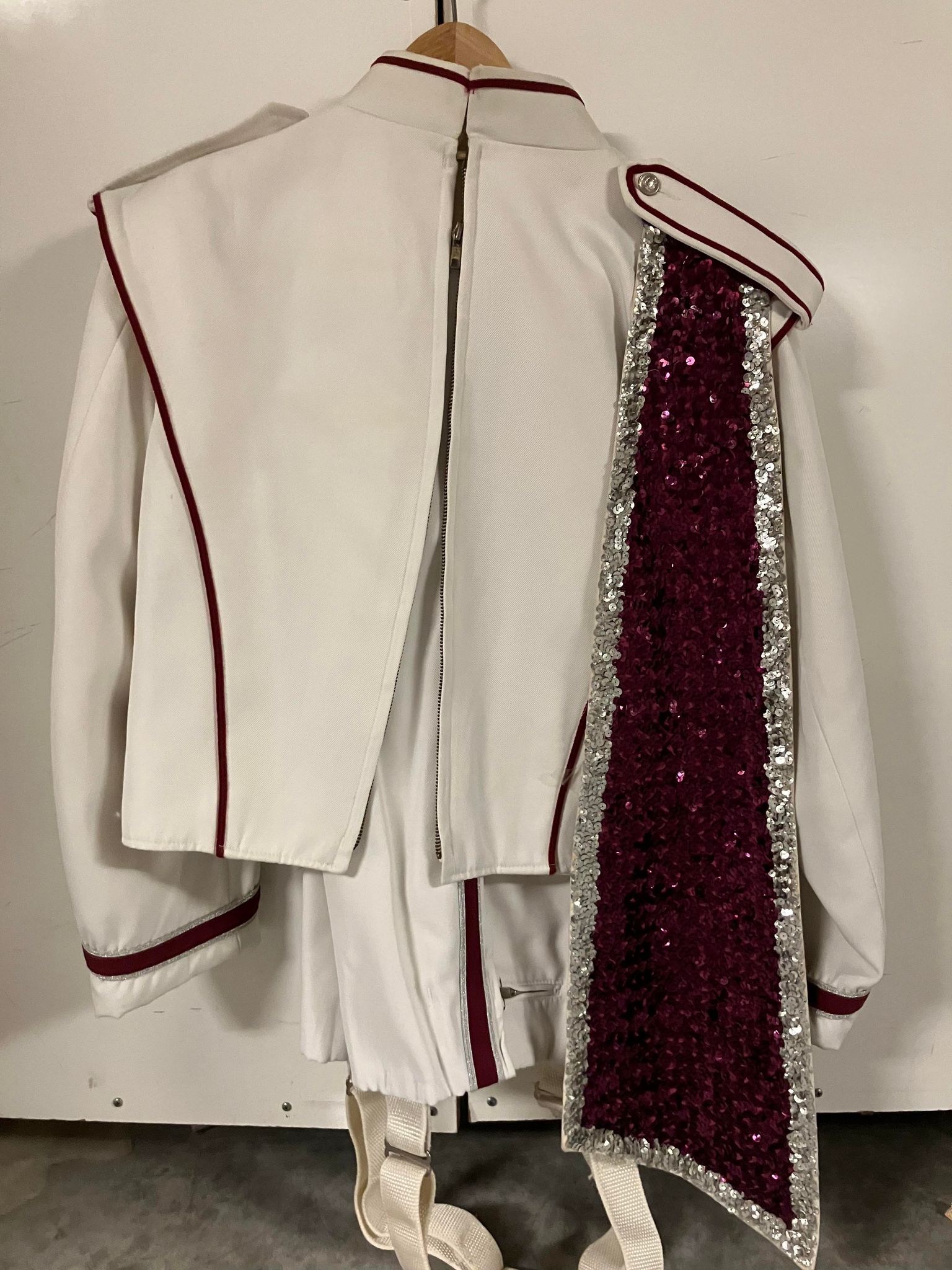 114 complete sets of White with Maroon used marching band uniforms
