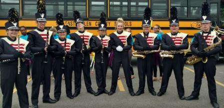 Set of 76 Ivory, Navy, and Red Stanbury Marching Band Uniforms with Gauntlets, Shakos and Plumes