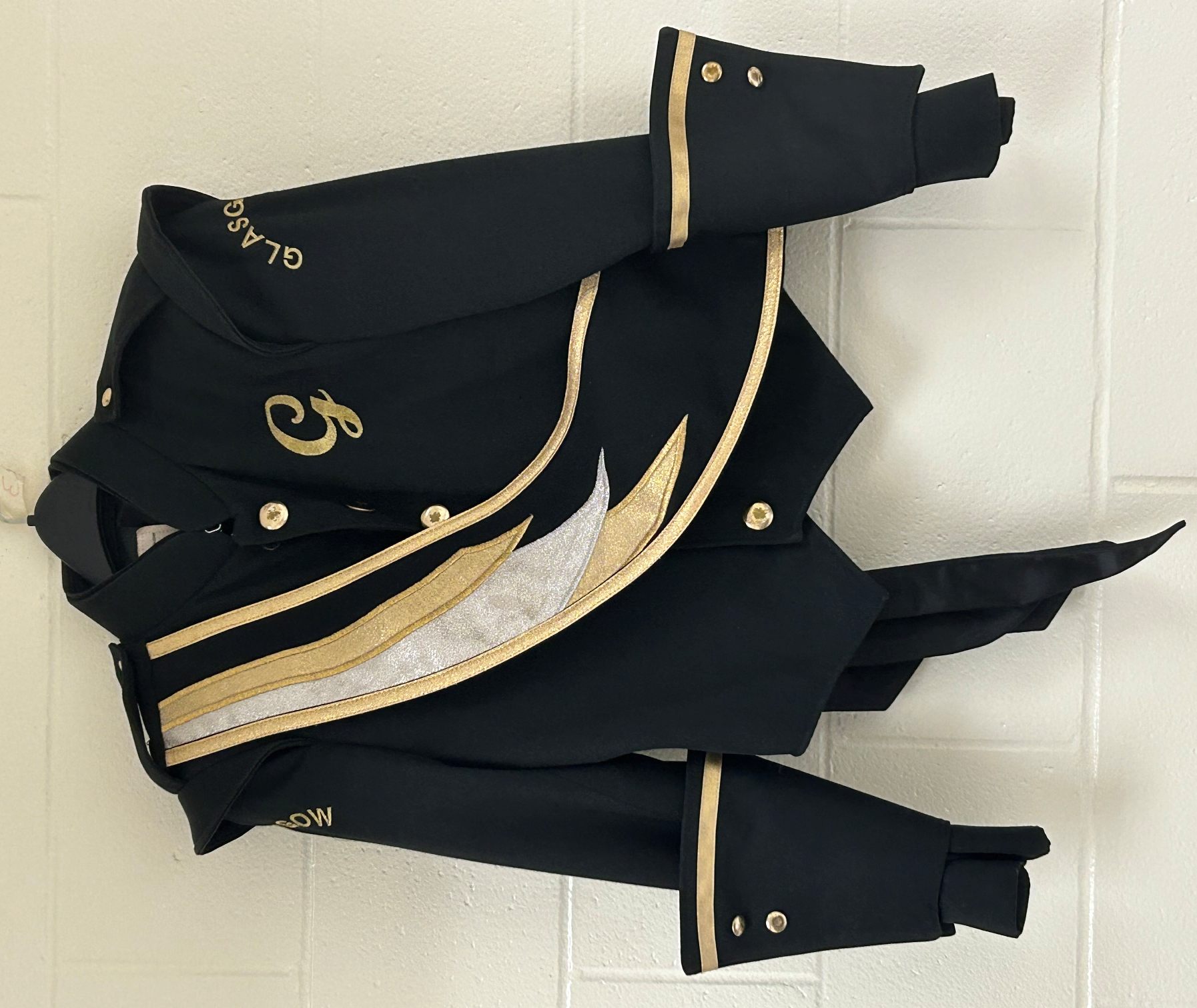 Lot of 65 Black and Gold Marching Band Uniforms Including Helmets and Plumes