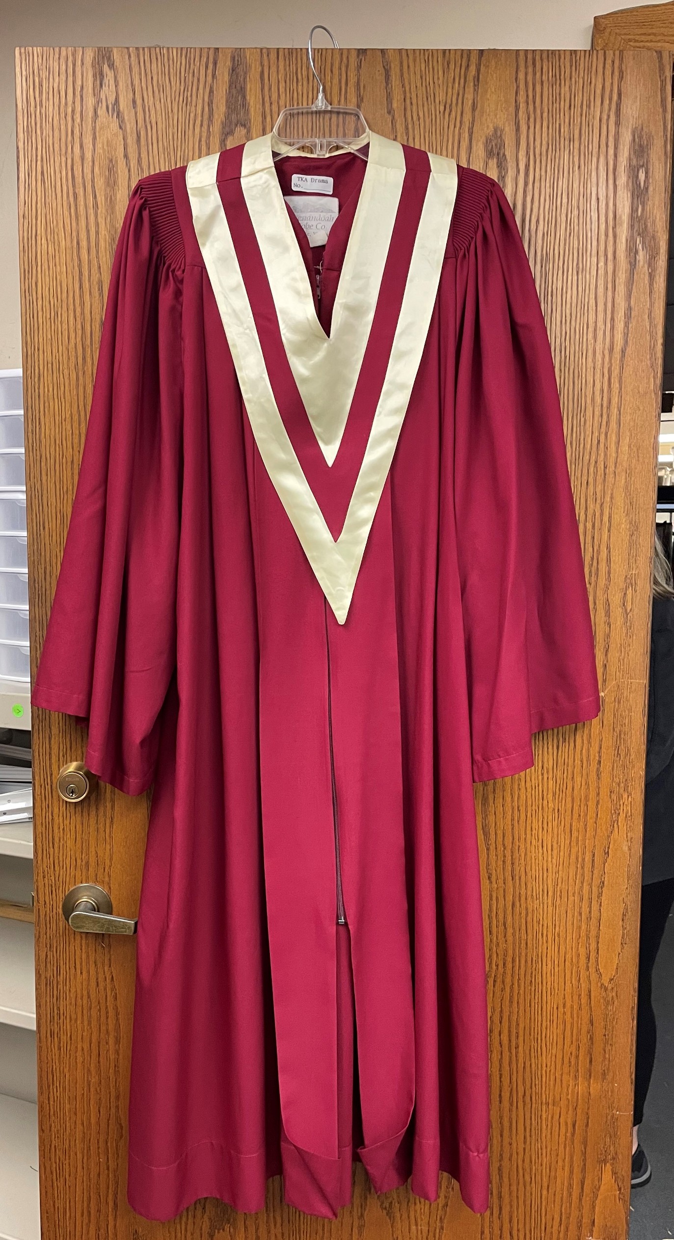 Lot of red choir robes and matching stoles