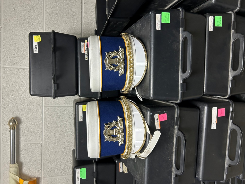 Set of 65 Blue, White and Gold Shakos with Cases