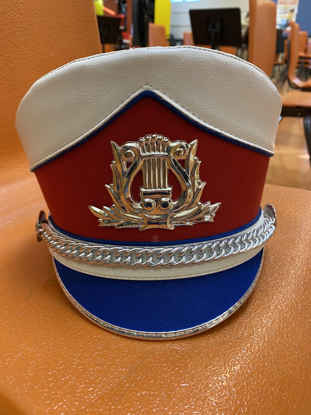 Set of 53 marching band hats with case (no plume included)